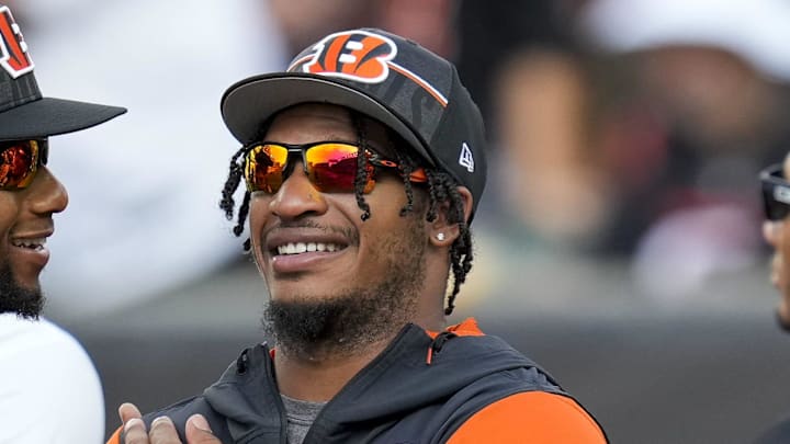 Cincinnati Bengals running back Joe Mixon (28) and wide receiver Ja'Marr Chase (1) laugh during warmups before the first quarter of the NFL Preseason Week 1 game between the Cincinnati Bengals and the Green Bay Packers at Paycor Stadium in downtown Cincinnati on Friday, Aug. 11, 2023. The Packers led 21-16 at halftime.