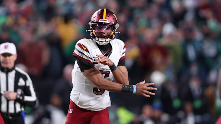 Jan 26, 2025; Philadelphia, PA, USA; Washington Commanders quarterback Jayden Daniels (5) passes the ball against the Philadelphia Eagles during the second half in the NFC Championship game at Lincoln Financial Field. Mandatory Credit: Bill Streicher-Imagn Images