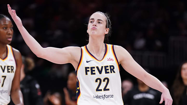 Jul 15, 2025; Boston, Massachusetts, USA; Indiana Fever guard Caitlin Clark (22) reacts to the crowd as they take on the Connecticut Sun in the first quarter at TD Garden. Mandatory Credit: David Butler II-Imagn Images