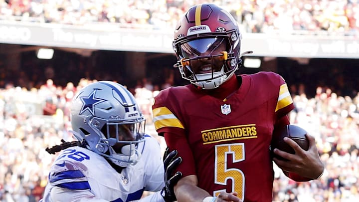 Nov 24, 2024; Landover, Maryland, USA; Washington Commanders quarterback Jayden Daniels (5) Mandatory Credit: Peter Casey-Imagn Images Nov 24, 2024; Landover, Maryland, USA; Washington Commanders quarterback Jayden Daniels (5) Mandatory Credit: Peter Casey-Imagn Images