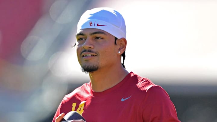 Oct 11, 2025; Los Angeles, California, USA;  USC Trojans quarterback Jayden Maiava (14) warms up prior to the game against the Michigan Wolverines at United Airlines Field at the Los Angeles Memorial Coliseum. Mandatory Credit: Jayne Kamin-Oncea-Imagn Images