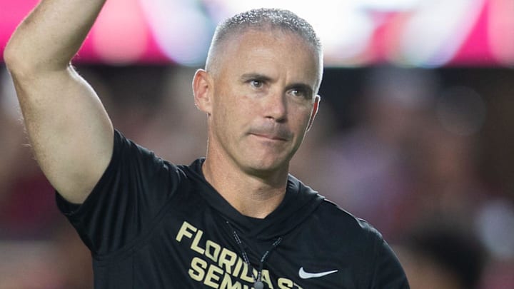 Florida State Seminoles head coach Mike Norvell walks down the field. The Miami Hurricanes lead the Florida State Seminoles 14-3 at the half on Saturday, Oct. 4, 2025.