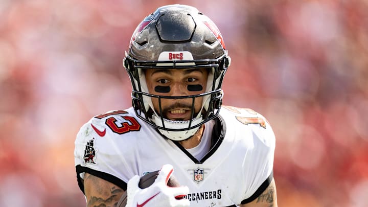 Oct 9, 2022; Tampa, Florida, USA; Tampa Bay Buccaneers wide receiver Mike Evans (13) runs with the ball after a catch during the second half against the Atlanta Falcons at Raymond James Stadium. Mandatory Credit: Matt Pendleton-Imagn Images