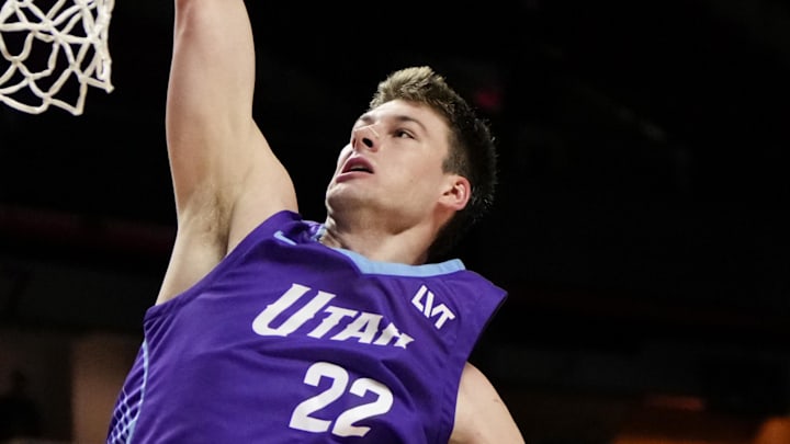 Jul 14, 2025; Las Vegas, NV, USA;  Utah Jazz forward Kyle Filipowski (22) dunks the ball against the San Antonio Spurs during the first half of a NBA basketball game at the Thomas & Mack Center. Mandatory Credit: Lucas Peltier-Imagn Images