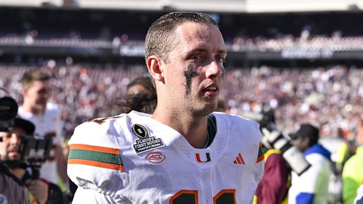 Dec 20, 2025; College Station, TX, USA; Miami Hurricanes quarterback Carson Beck (11) walks off the field after the Hurricanes win over the Texas A&M Aggies at Kyle Field. Mandatory Credit: Jerome Miron-Imagn Images
