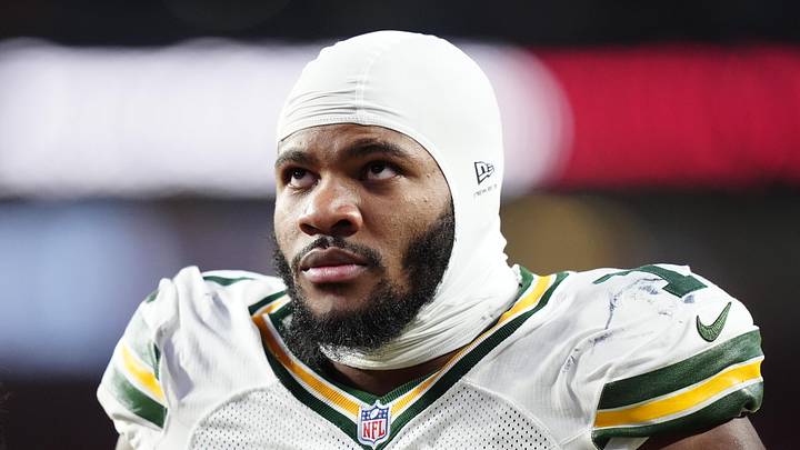 Dec 14, 2025; Denver, Colorado, USA; Green Bay Packers defensive end Micah Parsons (1) walks off the field with help from medical personnel following an injury during the third quarter against the Denver Broncos at Empower Field at Mile High. Mandatory Credit: Ron Chenoy-Imagn Images