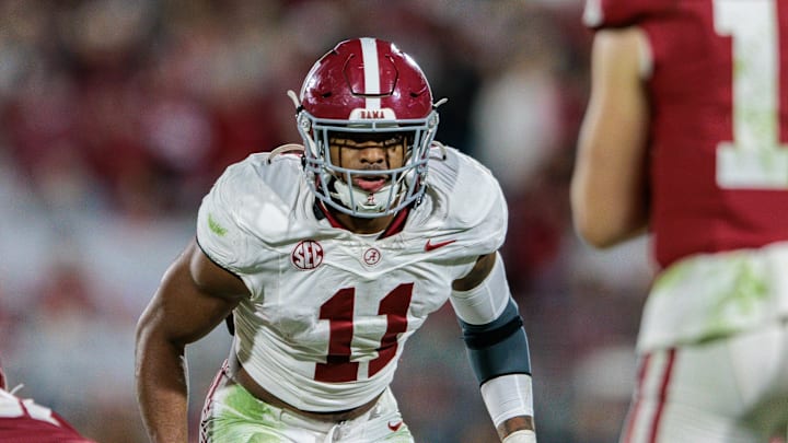 Nov 23, 2024; Norman, Oklahoma, USA;  Alabama Crimson Tide linebacker Jihaad Campbell (11) ready for the play during the third quarter against the Oklahoma Sooners at Gaylord Family-Oklahoma Memorial Stadium. Mandatory Credit: William Purnell-Imagn Images