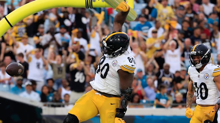 Pittsburgh Steelers tight end Darnell Washington (80) is called for unsportsmanlike conduct penality after dunking the crossbar after a touchdown score during the first quarter of an NFL preseason matchup at EverBank Stadium, Saturday, Aug. 9, 2025 in Jacksonville, Fla. [Corey Perrine/Florida Times-Union]