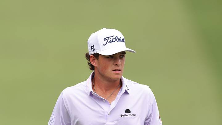 Aug 2, 2025; Greensboro, North Carolina, USA; Jackson Koivun walks onto the 18th green during the third round of the Wyndham Championship golf tournament. Mandatory Credit: Allison Lawhon-Imagn Images