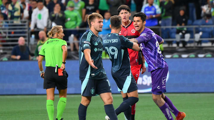 Aug 6, 2025; Seattle, WA, USA; Tijuana goalkeeper Jorge Hernandez (29) shoves Seattle Sounders FC forward Daniel Musovski (19) during the second half at Lumen Field. Mandatory Credit: Steven Bisig-Imagn Images