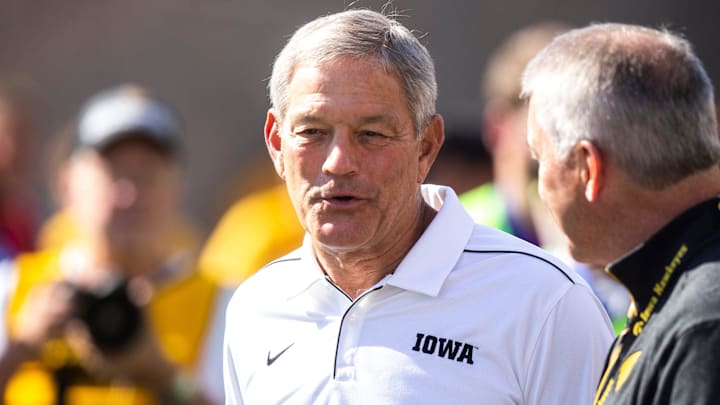 Iowa head coach Kirk Ferentz talks with athletics director Gary Barta before a NCAA Big Ten Conference football game against Rutgers, Saturday, Sept. 7, 2019, at Kinnick Stadium in Iowa City, Iowa. Iowa head coach Kirk Ferentz talks with athletics director Gary Barta before a NCAA Big Ten Conference football game against Rutgers, Saturday, Sept. 7, 2019, at Kinnick Stadium in Iowa City, Iowa.