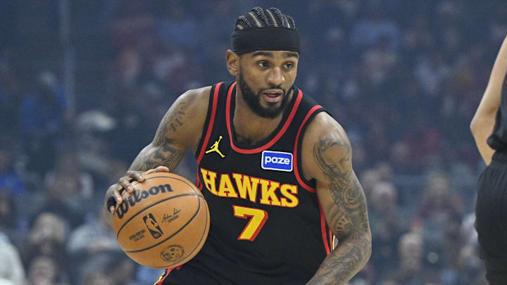 Apr 8, 2026; Cleveland, Ohio, USA; Atlanta Hawks guard Nickeil Alexander-Walker (7) brings the ball up court against the Cleveland Cavaliers in the first quarter at Rocket Arena. Mandatory Credit: David Richard-Imagn Images
