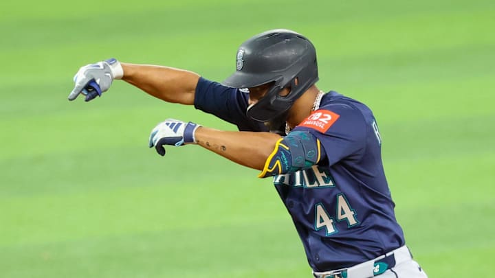 Seattle Mariners center fielder Julio Rodriguez (44) reacts after hitting a double during the third inning against the Texas Rangers at Globe Life Field on June 27. Seattle Mariners center fielder Julio Rodriguez (44) reacts after hitting a double during the third inning against the Texas Rangers at Globe Life Field on June 27.