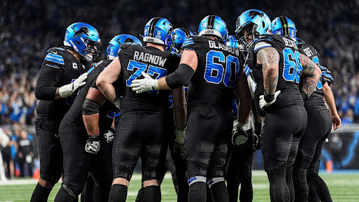 Detroit Lions offensive line huddle before a play against Minnesota Vikings during the second half at Ford Field