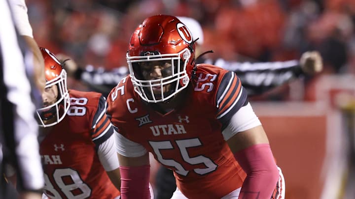 Utah Utes offensive lineman Spencer Fano (55) waits for the play during the third quarter of a game at Rice-Eccles Stadium.