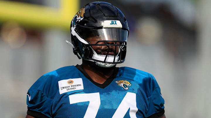 Jacksonville Jaguars offensive tackle Cam Robinson (74) looks on during the third day of an NFL football training camp practice Friday, July 26, 2024 at EverBank Stadium’s Miller Electric Center in Jacksonville, Fla.