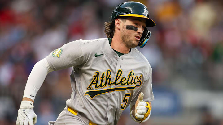 Mar 31, 2026; Atlanta, Georgia, USA; Athletics shortstop Jacob Wilson (5) hits a two-run ground rule double against the Atlanta Braves in the second inning at Truist Park. Mandatory Credit: Brett Davis-Imagn Images