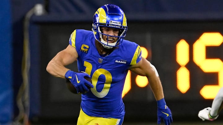 Nov 24, 2024; Inglewood, California, USA;  Los Angeles Rams wide receiver Cooper Kupp (10) runs after a catch against the Philadelphia Eagles during the second half at SoFi Stadium. Mandatory Credit: Alex Gallardo-Imagn Images