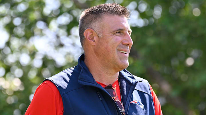Jul 28, 2025; Foxborough, MA, USA; New England Patriots head coach Mike Vrabel heads to the practice fields for training camp at Gillette Stadium. Mandatory Credit: Eric Canha-Imagn Images
