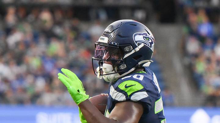 Seattle Seahawks running back TJ Harden carries the ball against the Dallas Cowboys.