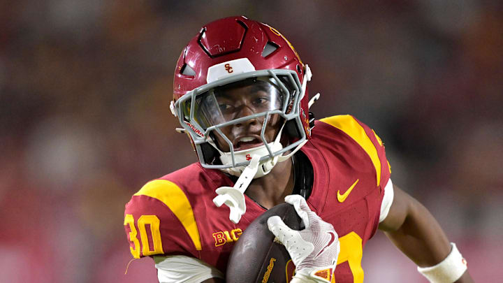 Sep 6, 2025; Los Angeles, California, USA; USC Trojans running back King Miller (30) carries the ball down the field for a touchdown in the second half against the Georgia Southern Eagles at the Los Angeles Memorial Coliseum. Mandatory Credit: Jayne Kamin-Oncea-Imagn Images