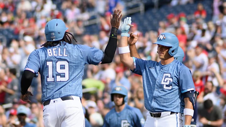 Apr 5, 2025; Washington, District of Columbia, USA; Washington Nationals outfielder James Wood (29) celebrates with outfielder Alex Call (17) after scoring a run during the first inning against the Arizona Diamondbacks at Nationals Park.