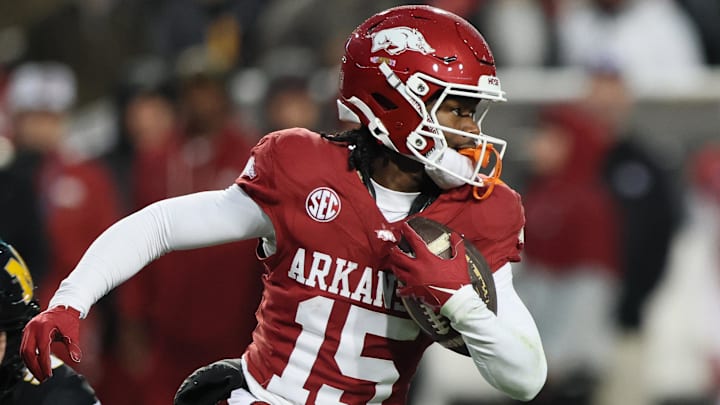 Arkansas Razorbacks wide receiver Cam Shanks (15) returns a punt during the third quarter against the Missouri Tigers in a game at Razorback Stadium in Fayetteville, Ark.
