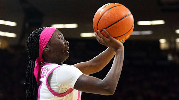 Iowa guard Chit-Chat Wright (11) shoots the basketball during a game against the Washington Huskies Feb. 11, 2026 at Carver-Hawkeye Arena in Iowa City, Iowa.
