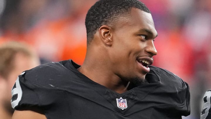 Dec 7, 2025; Paradise, Nevada, USA;  Las Vegas Raiders defensive end Tyree Wilson (9) and defensive end Charles Snowden (49) leave the field following a game against the Denver Broncos at Allegiant Stadium. Mandatory Credit: Stephen R. Sylvanie-Imagn Images