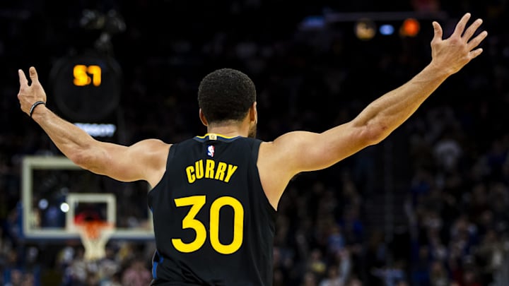 Dec 20, 2025; San Francisco, California, USA; Golden State Warriors guard Stephen Curry (30) reacts after scoring against the Phoenix Suns during the fourth quarter at Chase Center. Mandatory Credit: John Hefti-Imagn Images