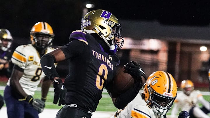 Booker's Chauncey Kennon runs upfield during the Class 3A-Region 3 Final against Boca Ciega in Sarasota on Friday, Nov. 29, 2024. Booker won 41-6.
