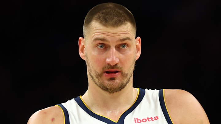 Mar 24, 2026; Phoenix, Arizona, USA; Denver Nuggets center Nikola Jokic (15) reacts against the Phoenix Suns in the first half at Mortgage Matchup Center. Mandatory Credit: Mark J. Rebilas-Imagn Images Mar 24, 2026; Phoenix, Arizona, USA; Denver Nuggets center Nikola Jokic (15) reacts against the Phoenix Suns in the first half at Mortgage Matchup Center. Mandatory Credit: Mark J. Rebilas-Imagn Images