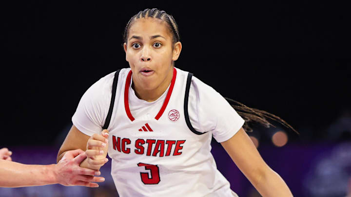 Mar 6, 2026; Duluth, GA, USA; North Carolina State Wolfpack guard Zamareya Jones (3) drives to the basket against the Notre Dame Fighting Irish in the fourth quarter at Gas South Arena. Mandatory Credit: Brett Davis-Imagn Images