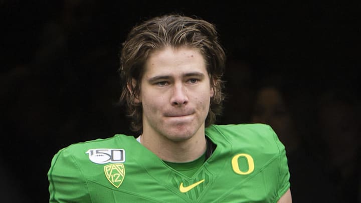 Nov 30, 2019; Eugene, OR, USA; Oregon Ducks quarterback Justin Herbert (10) waits in a tunnel during senior day introductions before a game against the Oregon State Beavers at Autzen Stadium. Mandatory Credit: Troy Wayrynen-Imagn Images Nov 30, 2019; Eugene, OR, USA; Oregon Ducks quarterback Justin Herbert (10) waits in a tunnel during senior day introductions before a game against the Oregon State Beavers at Autzen Stadium. Mandatory Credit: Troy Wayrynen-Imagn Images