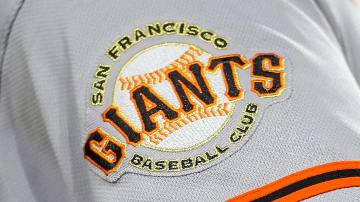 The San Francisco Giants logo on the sleeve of a player's uniform.