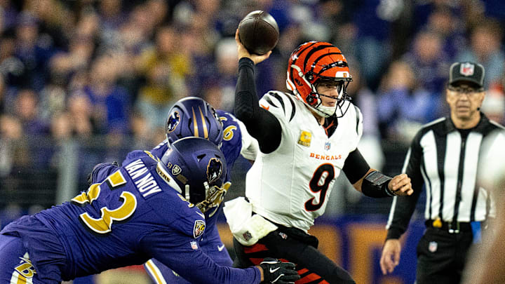 Baltimore Ravens outside linebacker Odafe Oweh (99) and Baltimore Ravens outside linebacker Kyle Van Noy (53) force Cincinnati Bengals quarterback Joe Burrow (9) out of the pocket =in the fourth quarter of the NFL game at M&T Banks Stadium in Baltimore on Thursday, Nov. 7, 2024. Baltimore Ravens outside linebacker Odafe Oweh (99) and Baltimore Ravens outside linebacker Kyle Van Noy (53) force Cincinnati Bengals quarterback Joe Burrow (9) out of the pocket =in the fourth quarter of the NFL game at M&T Banks Stadium in Baltimore on Thursday, Nov. 7, 2024.
