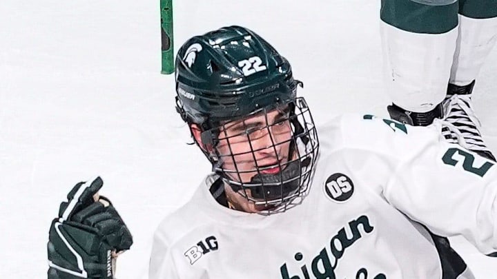 Michigan State forward Porter Martone (22) celebrates scoring a goal against Michigan during the first period of Duel in the D at Little Caesars Arena in Detroit on Saturday, February 7, 2026.