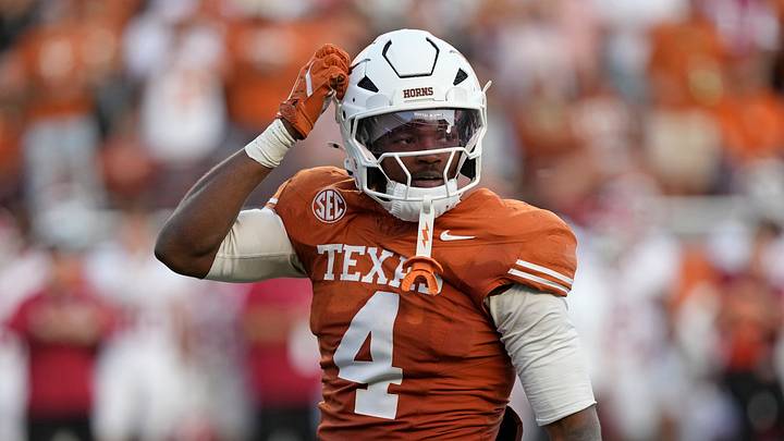 Texas Longhorns defensive back Jelani McDonald (4) scratches his helmet after making a tackle during the second half against the Arkansas Razorbacks at Darrell K Royal-Texas Memorial Stadium. Texas Longhorns defensive back Jelani McDonald (4) scratches his helmet after making a tackle during the second half against the Arkansas Razorbacks at Darrell K Royal-Texas Memorial Stadium.