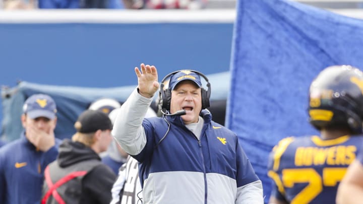 Nov 29, 2025; Morgantown, West Virginia, USA; West Virginia Mountaineers head coach Rich Rodriguez calls out a play during the second quarter against the Texas Tech Red Raiders at Milan Puskar Stadium. Mandatory Credit: Ben Queen-Imagn Images