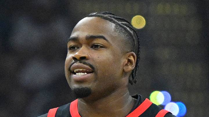 Toronto Raptors guard Jamal Shead brings the ball up court against the Cleveland Cavaliers.
