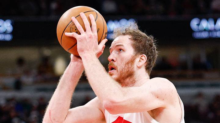 Mar 18, 2026; Chicago, Illinois, USA; Toronto Raptors center Jakob Poeltl (19) shoots against the Chicago Bulls during the first half at United Center. Mandatory Credit: Kamil Krzaczynski-Imagn Images