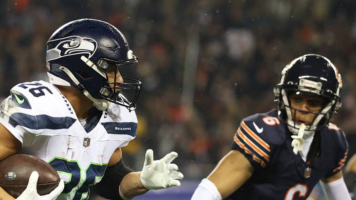 Seattle Seahawks running back Zach Charbonnet runs for a gain as Chicago Bears cornerback Kyler Gordon defends. Seattle Seahawks running back Zach Charbonnet runs for a gain as Chicago Bears cornerback Kyler Gordon defends.