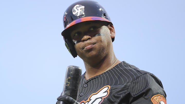 San Francisco Giants designated hitter Rafael Devers (16) reacts after striking out to end the fifth inning, leaving a runner on third base against the Philadelphia Phillies at Oracle Park. Man