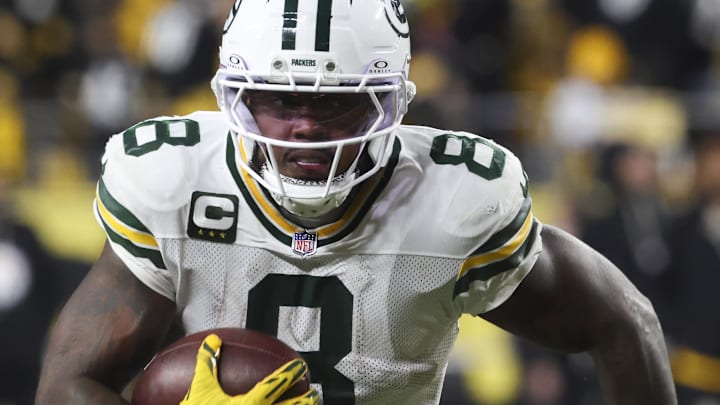 Green Bay Packers running back Josh Jacobs (8) runs for a touchdown against the Pittsburgh Steelers. Green Bay Packers running back Josh Jacobs (8) runs for a touchdown against the Pittsburgh Steelers.