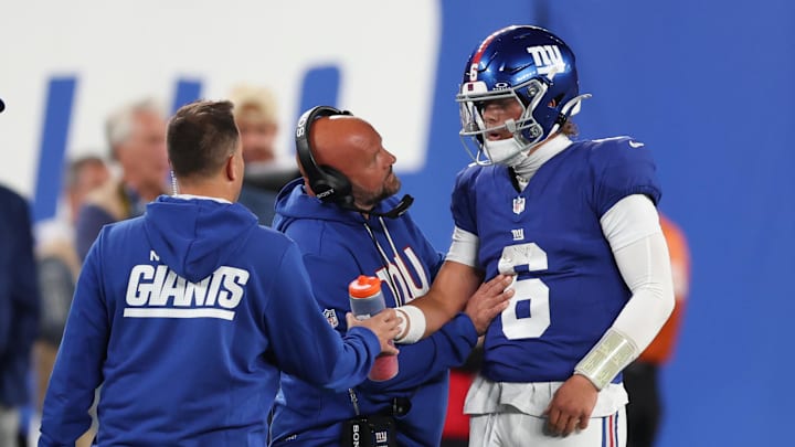 Brian Daboll went into the blue medical tent to check on Jaxson Dart on Thursday night.