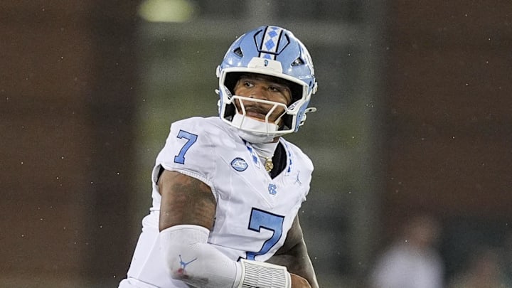Sep 6, 2025; Charlotte, North Carolina, USA; North Carolina Tar Heels quarterback Gio Lopez (7) during the second half against the Charlotte 49ers at Jerry Richardson Stadium. Mandatory Credit: Jim Dedmon-Imagn Images