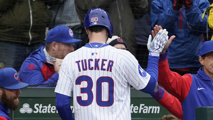 Apr 4, 2025; Chicago, Illinois, USA; Chicago Cubs outfielder Kyle Tucker (30) is greeted by manager Craig Counsell (11) after scoring against the San Diego Padres during the fifth inning at Wrigley Field.