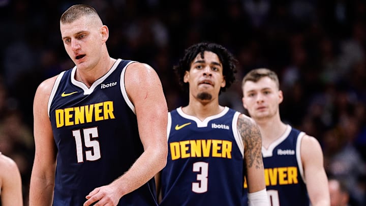 Nikola Jokic, Julian Strawther and guard Christian Braun