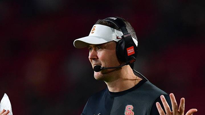 Sep 20, 2025; Los Angeles, California, USA; Southern California Trojans head coach Lincoln Riley watches game action against the Michigan State Spartans during the second half at the Los Angeles Memorial Coliseum. Mandatory Credit: Gary A. Vasquez-Imagn Images