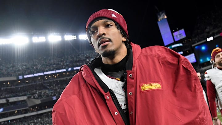Jan 26, 2025; Philadelphia, PA, USA; Washington Commanders quarterback Jayden Daniels (5) walks off the field after losing the NFC Championship game against the Philadelphia Eagles at Lincoln Financial Field. Mandatory Credit: Eric Hartline-Imagn Images